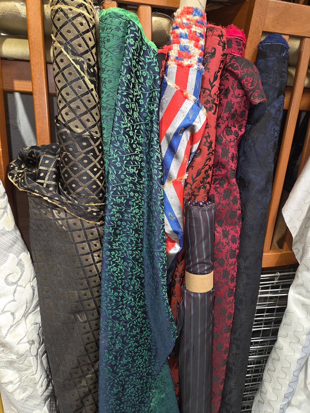 Lot 477 – A Collection of Patterned Fabric Rolls