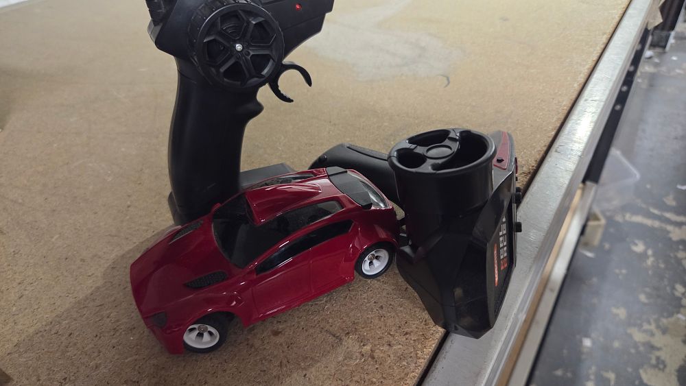 Lot 535 – A Remote Control Car with 2 controllers