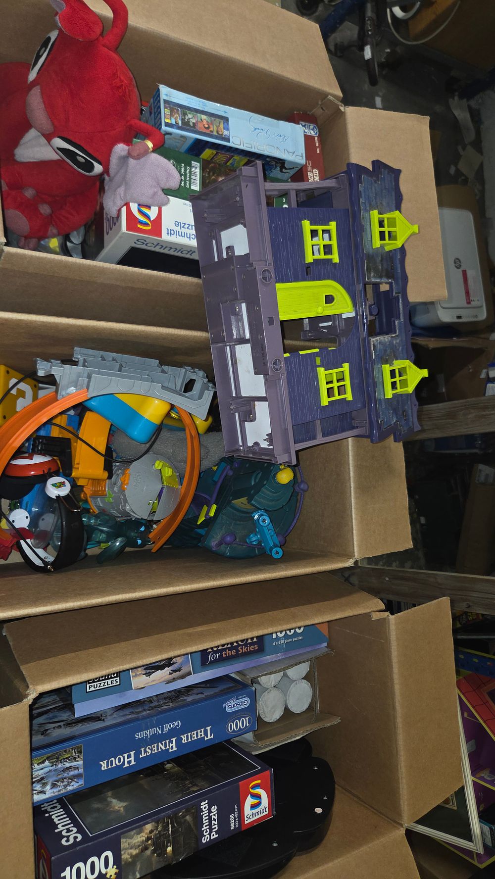 Lot 551 – Three Boxes of Toys and Puzzles