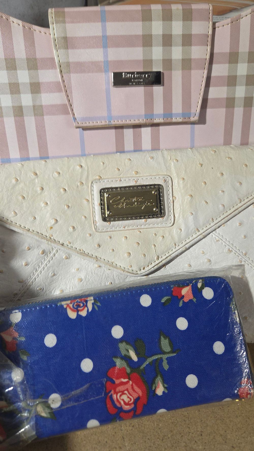 Lot 570 – A Trio of Fashion Handbags and a Patterned Wallet