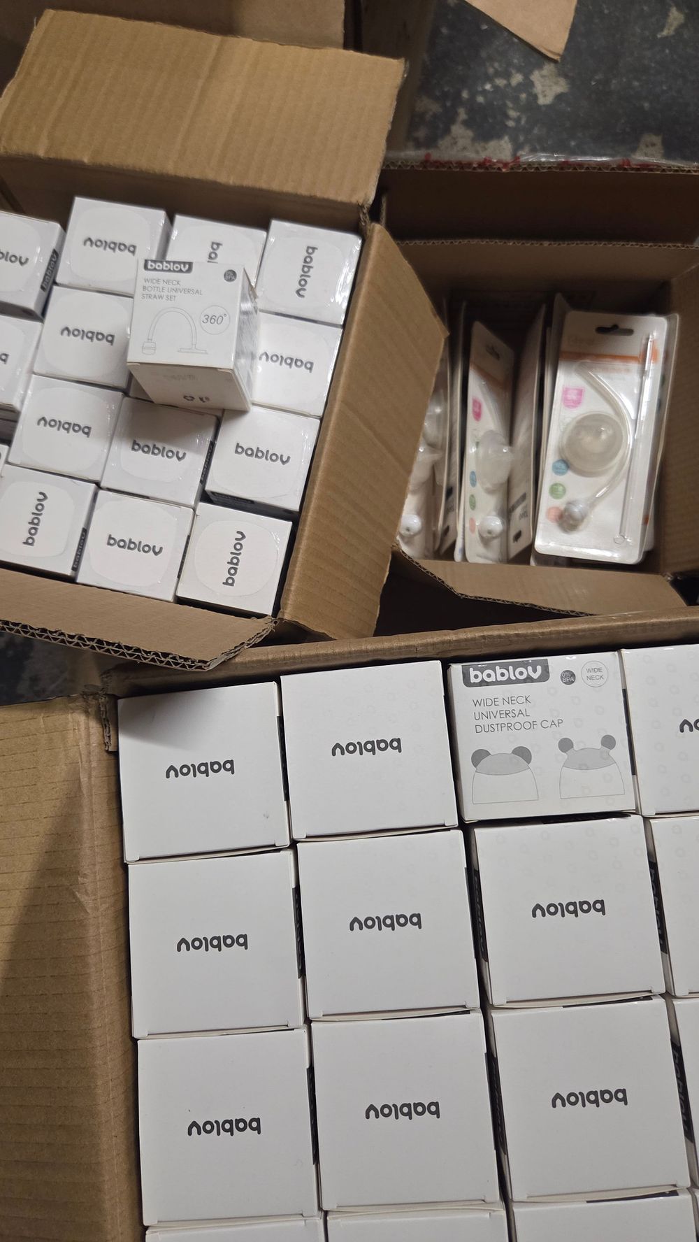 Lot 571 – Four Boxes of Bablov Universal Bottle Accessory Sets