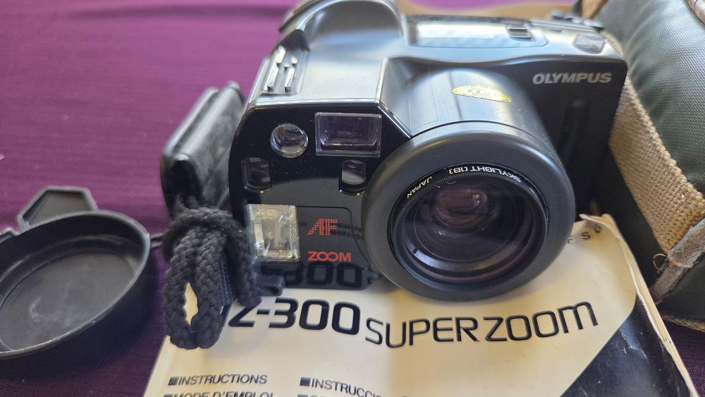 Lot 168 – Olympus AZ-300 Super Zoom 35mm Film Camera with Accessories