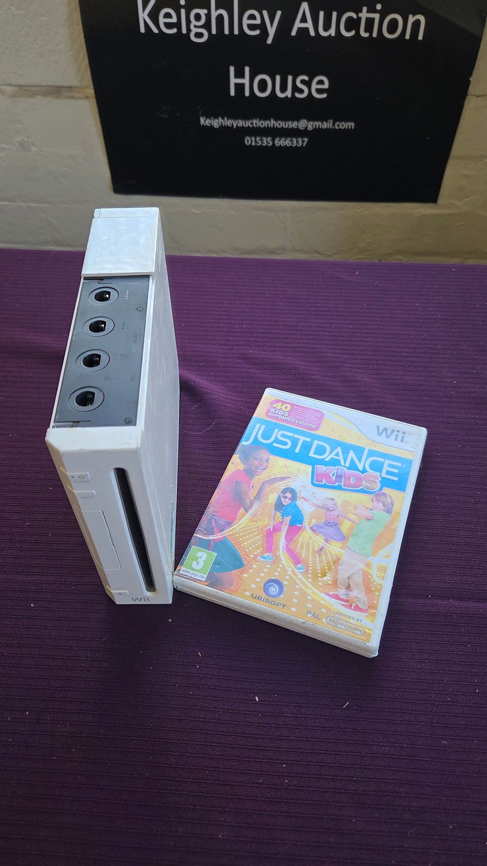 Lot 173 – Nintendo Wii Console and Just Dance Kids Video Game