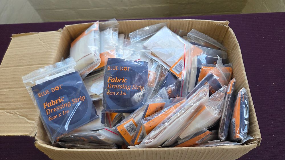 Lot 175 – A Box of Blue Dot Fabric Dressing Strips