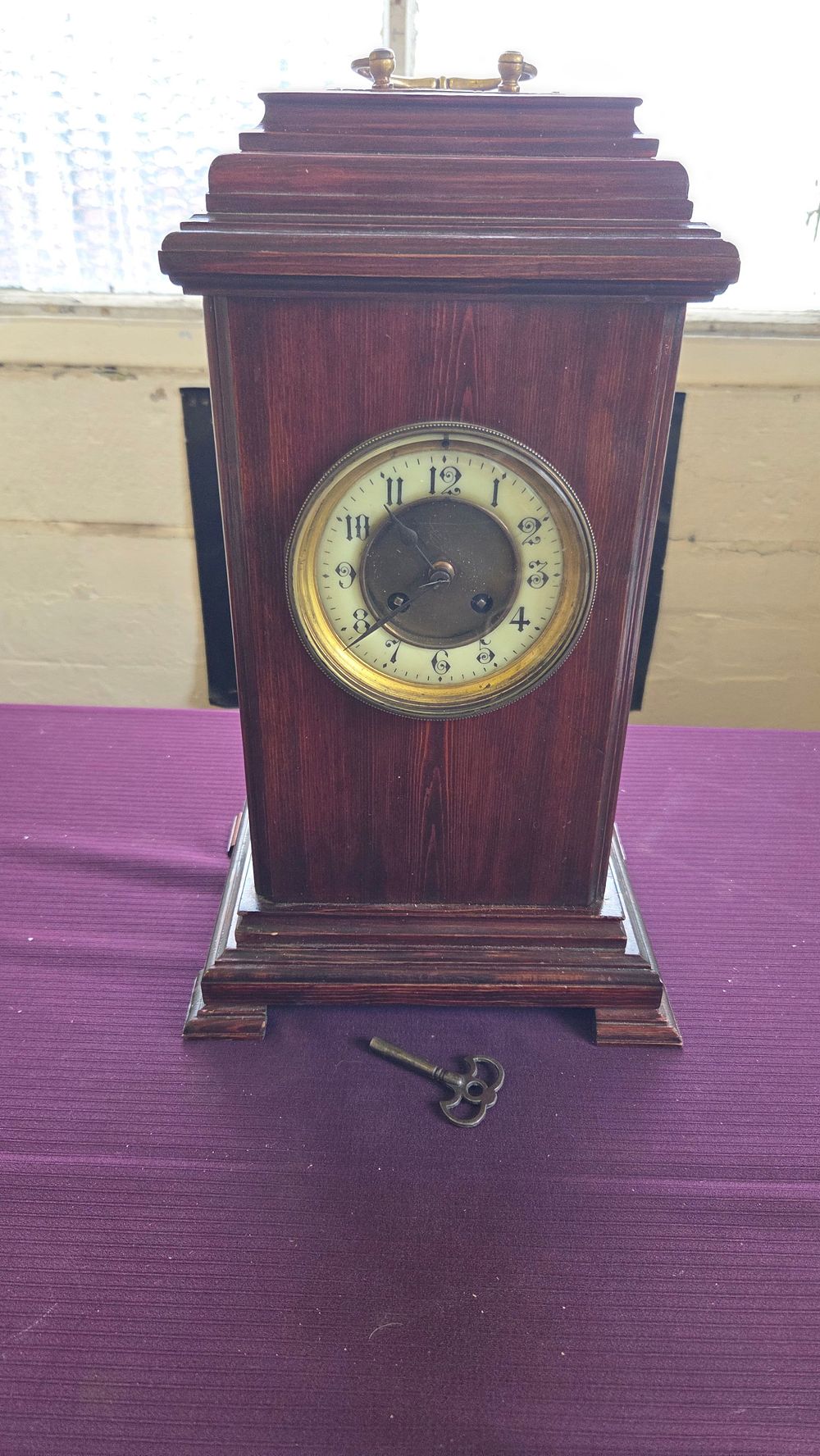 Lot 246 – An early 20th-century architectural mantel clock, attributed to the Arthur Pequegnat Clock Co. with key