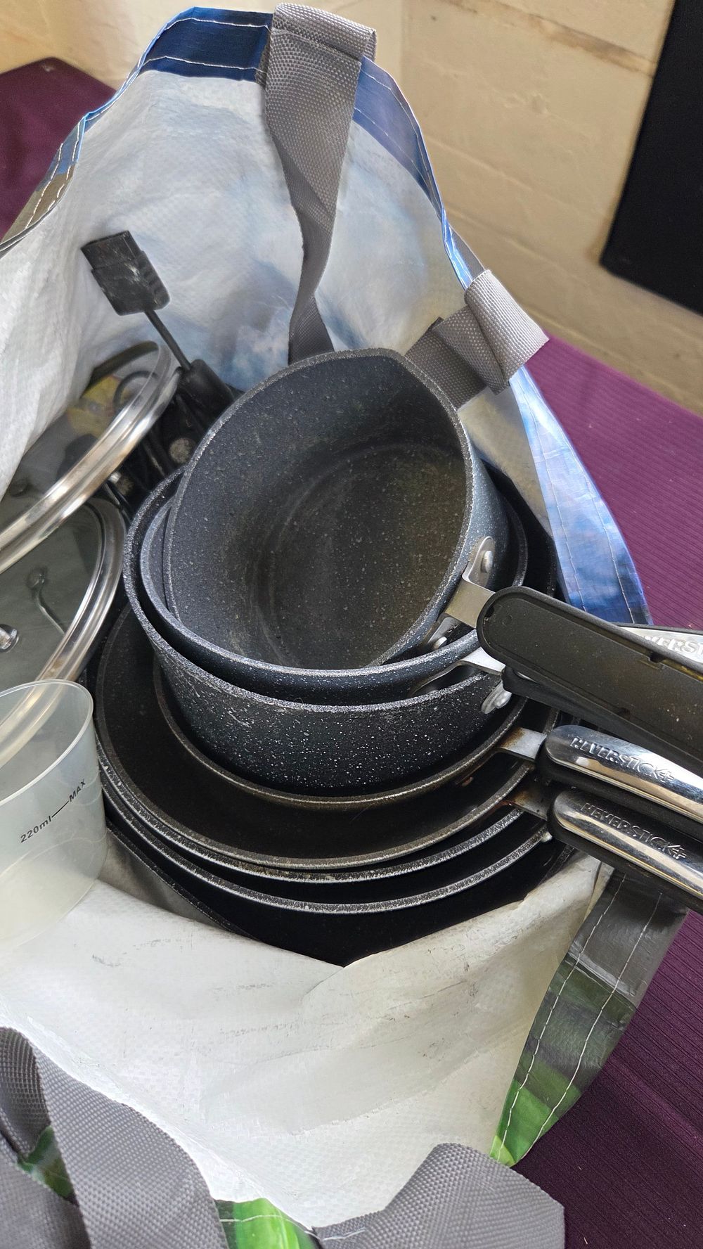 Lot 257 – Bag of Pans Including NEVERSTICK Non-Stick Cookware Set