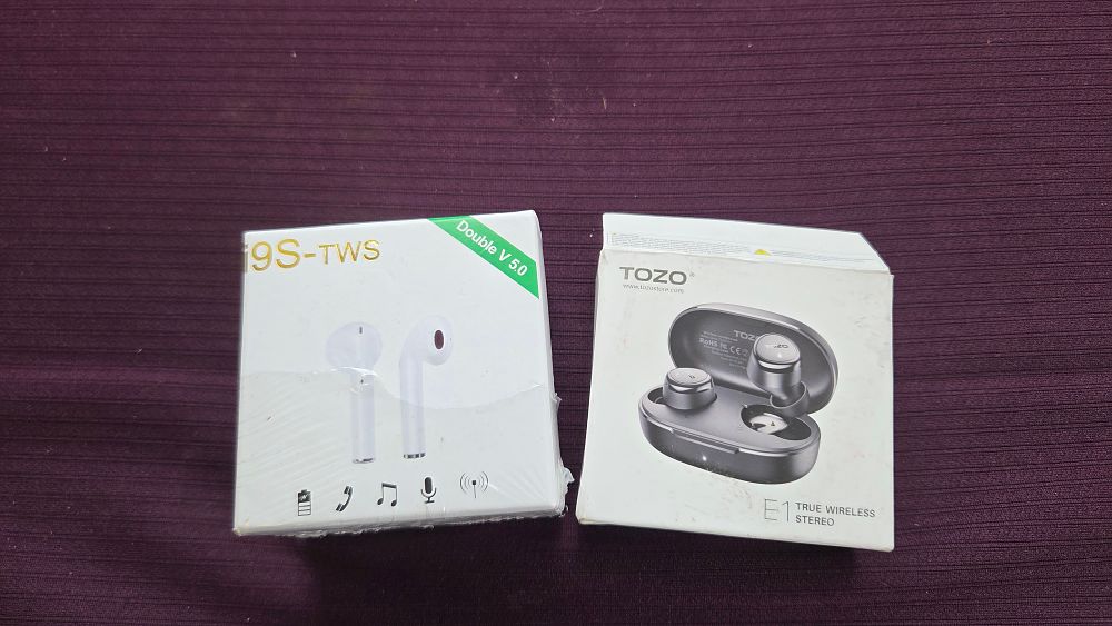 Lot 261 – Two i9S-TWS and TOZO E1 Wireless Earphones