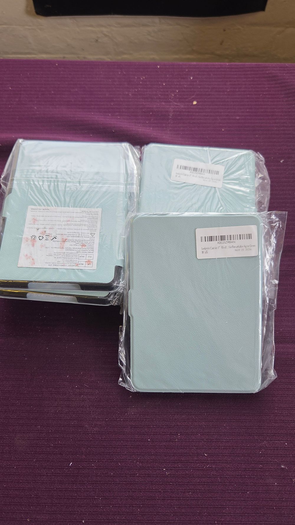 Lot 308 – Eight Sonlaryin Protective Tablet Cases for 7-inch Kindle
