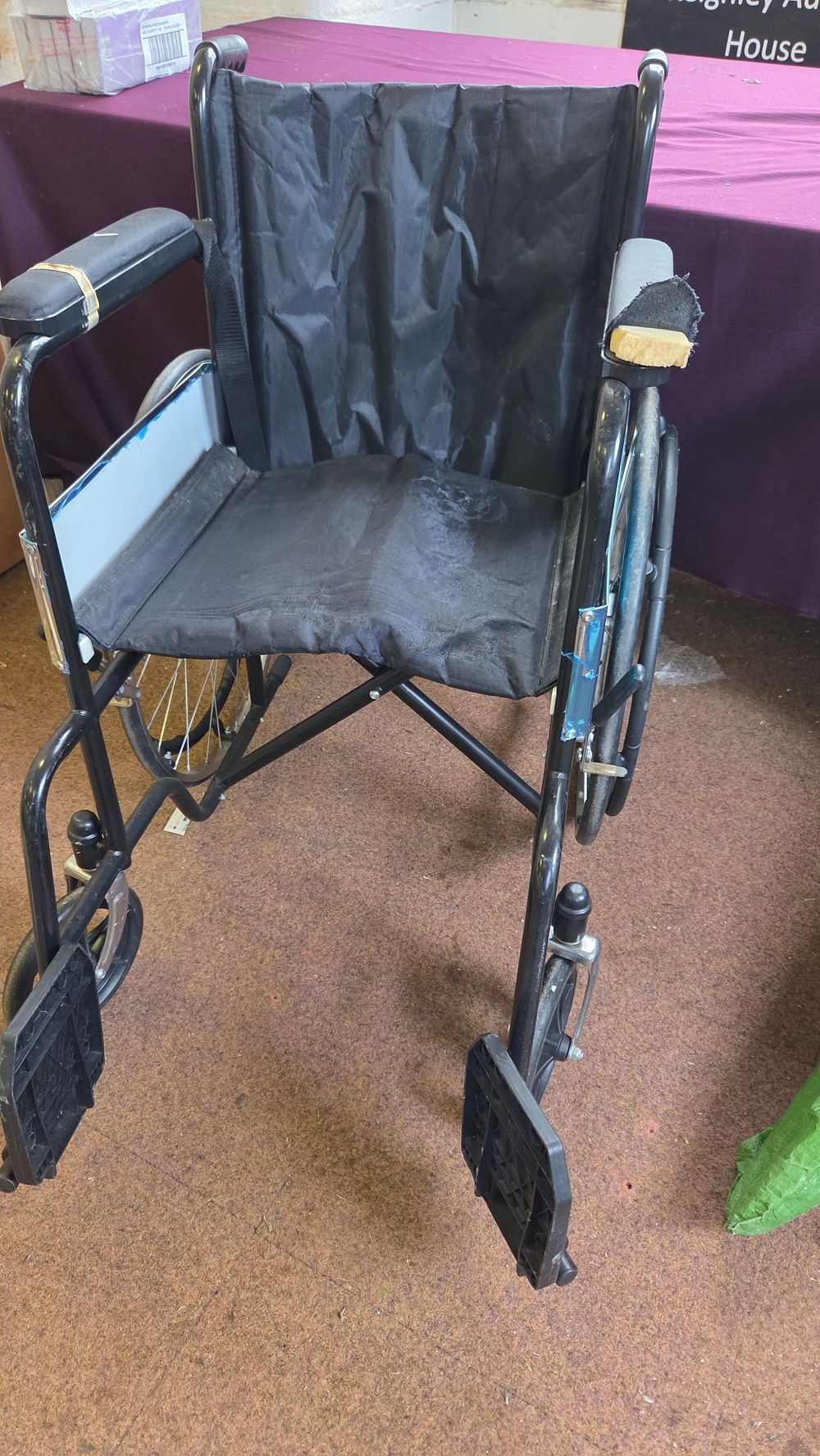 Lot 348 – A Folding Steel Manual Wheelchair