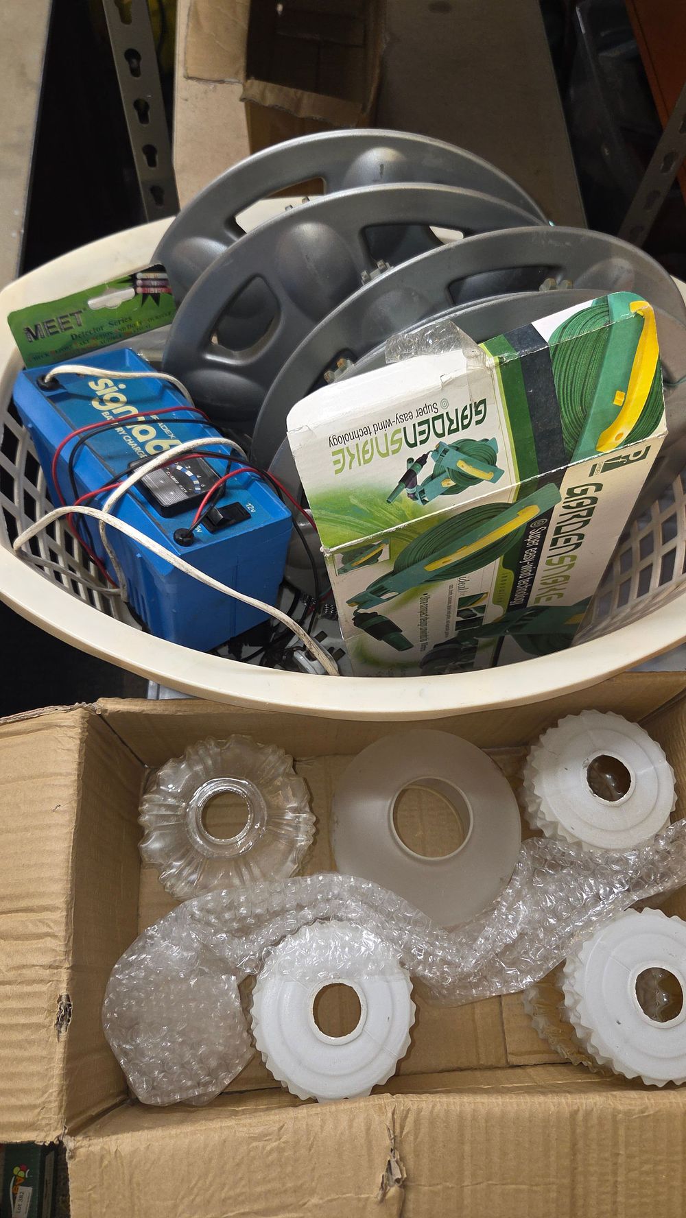 Lot 248 – A Basket of Miscellaneous Items. Including Wheel Trims