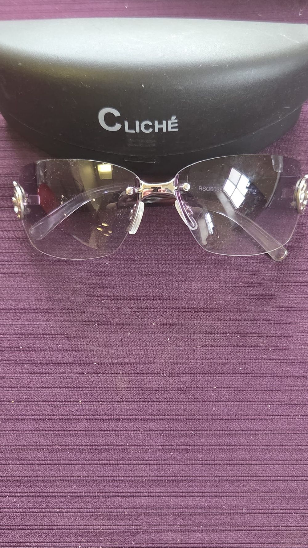 Lot 613 – A pair of rimless silver-tone sunglasses with gradient lenses and Cliché case