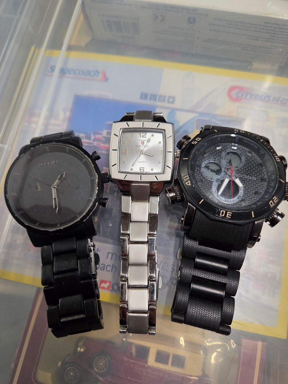 Lot 619 – A Trio of Wristwatches Including Fossil and Swiss Explorer