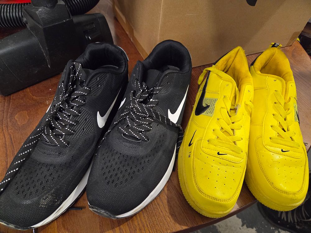 Lot 370 – Two pairs of Nike athletic trainers including Air Max 90 and Air Force 1 Utility styles Sizes 9 and 10
