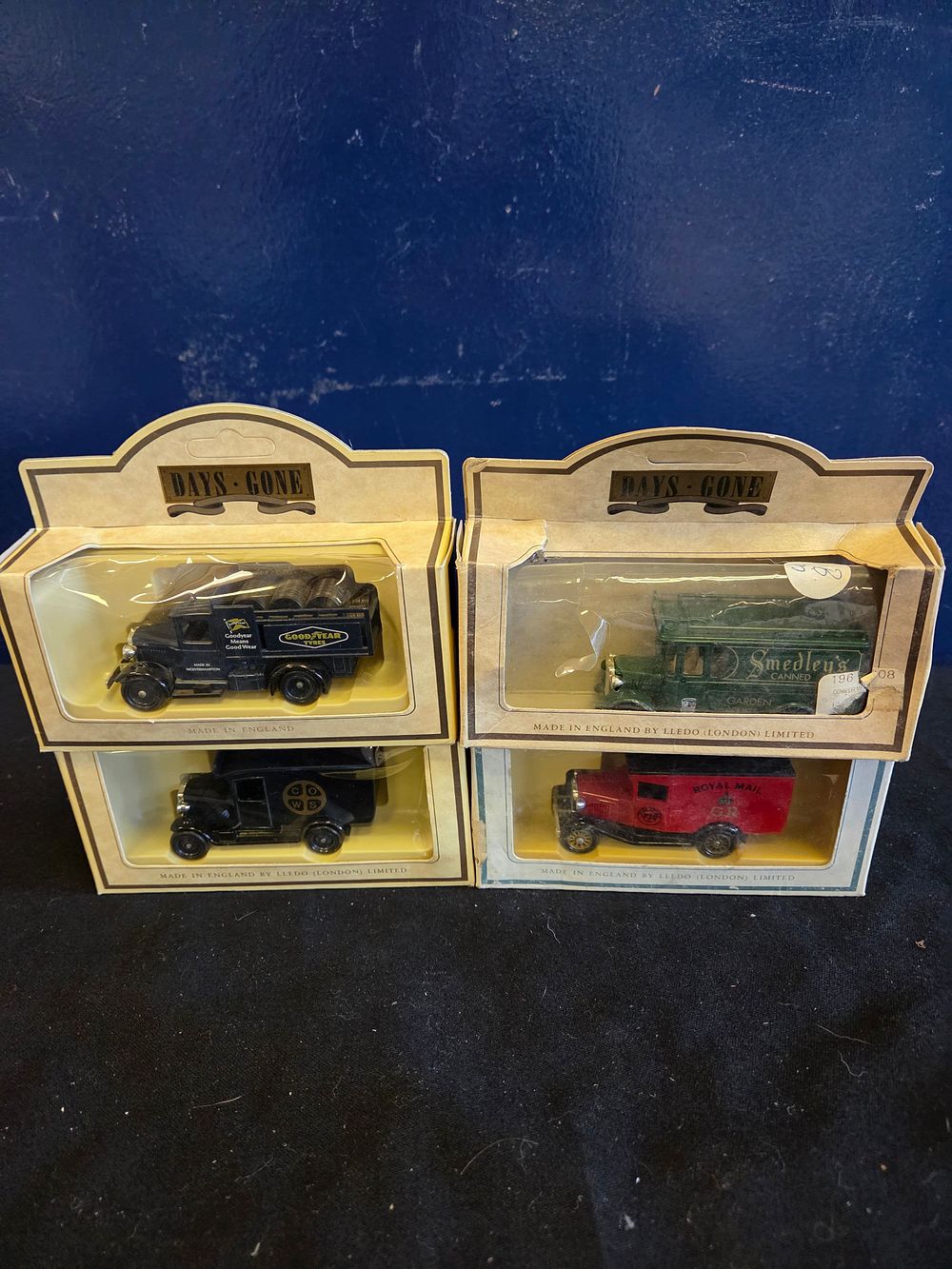 Lot 152 – A lot of four Lledo Days Gone die-cast model vehicles in original window boxes