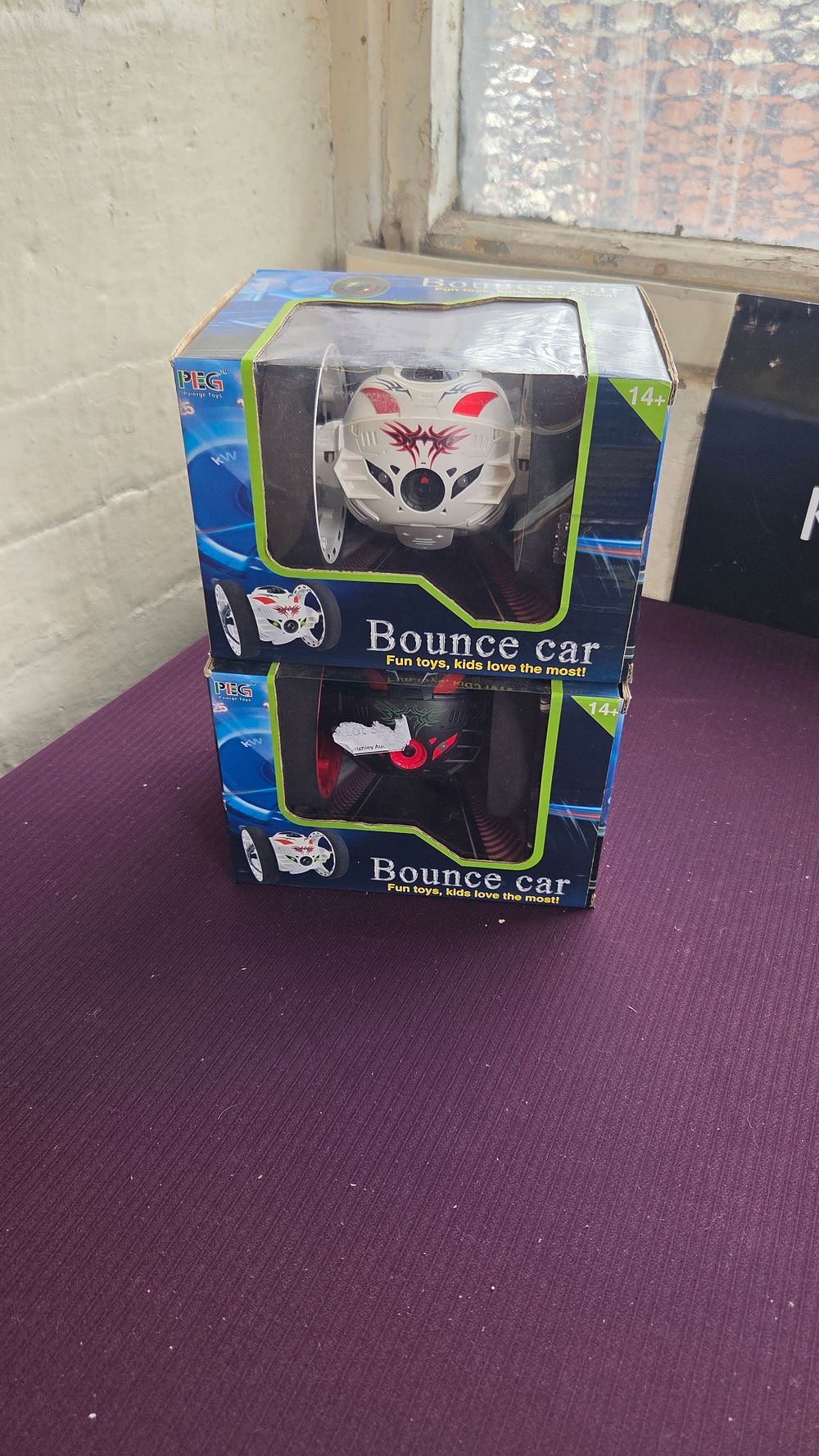 Lot 270 – A Pair of PEG Paierge Toys Remote Control Bounce Cars