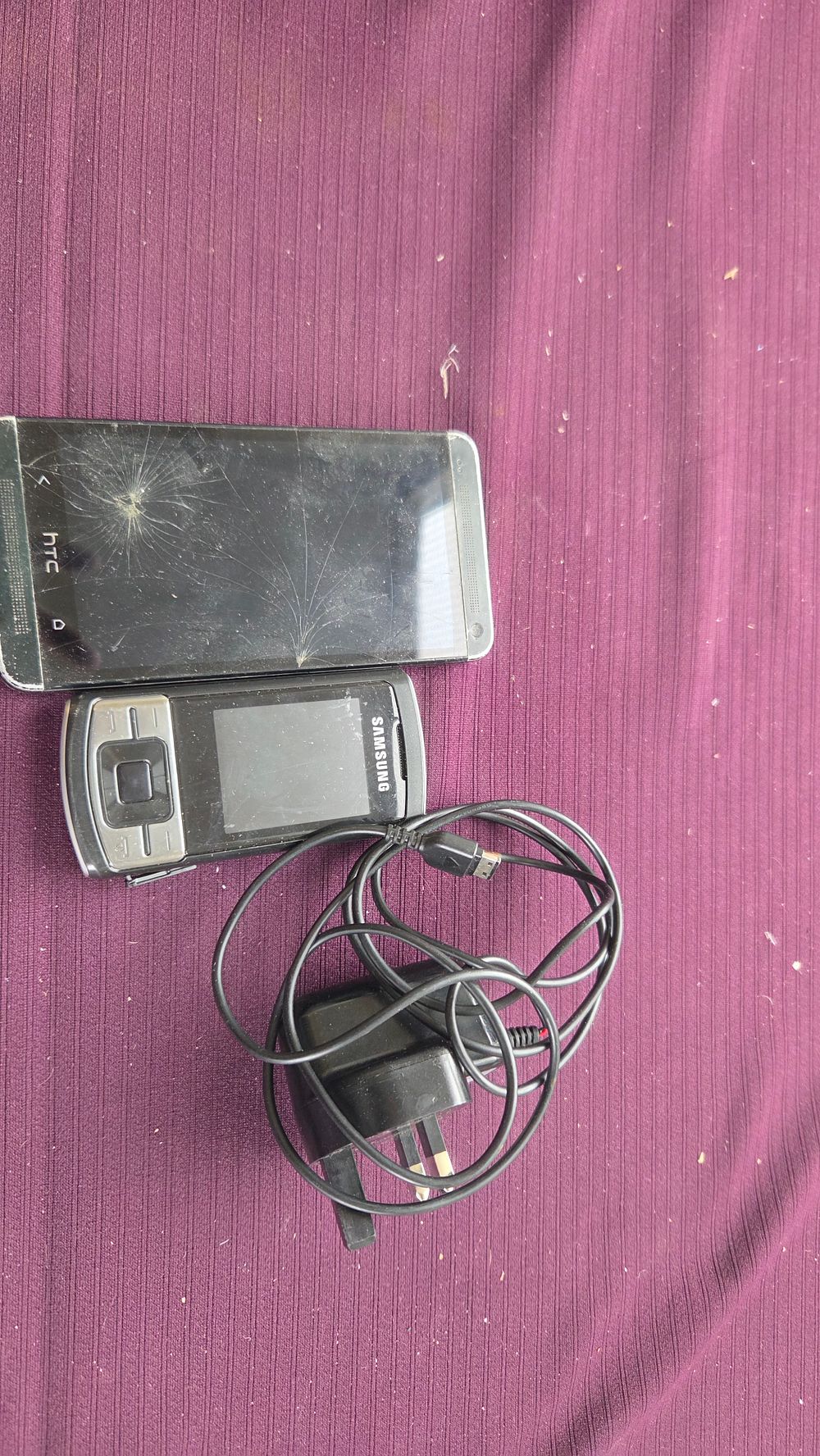 Lot 223 – Two Mobile Phones HTC One M7 Quad-core and Samsung SGH Slider