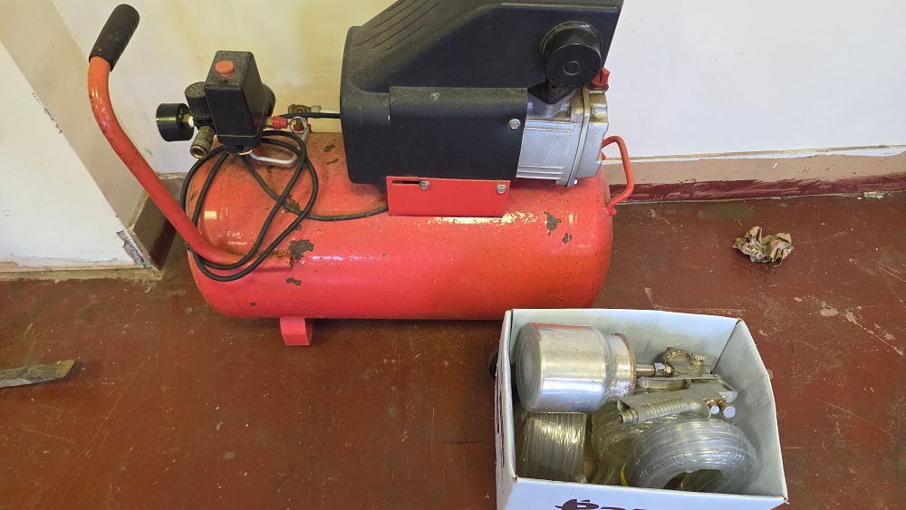 Lot 250 – Portable Electric Air Compressor powers on