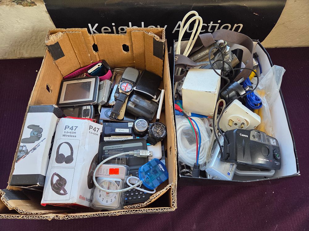 Lot 336 – An Assortment of Consumer Electronics, Cameras, and Personal Accessories