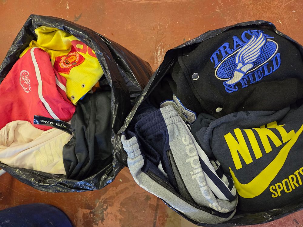 Lot 383 – A Collection of Mixed High-Street and Athletic Apparel Including Nike, Adidas, and Football Merchandise