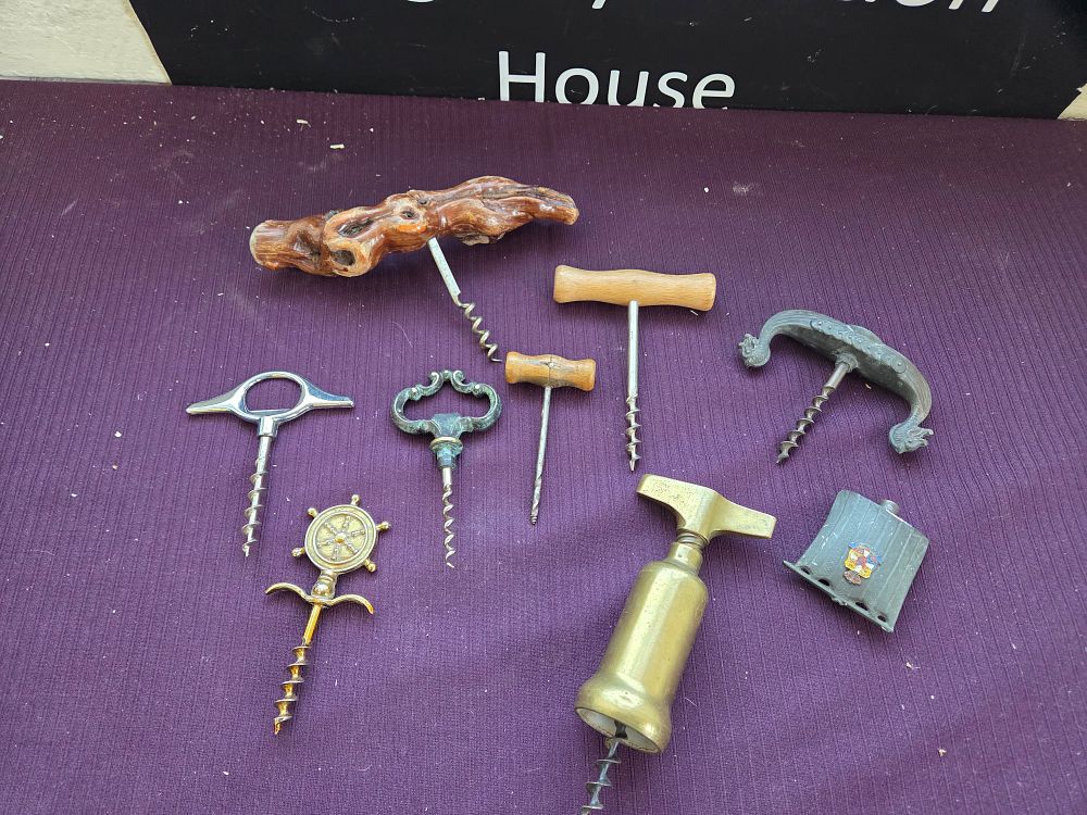 Lot 612 – A Collection of Vintage and Antique Corkscrews and Related Implements