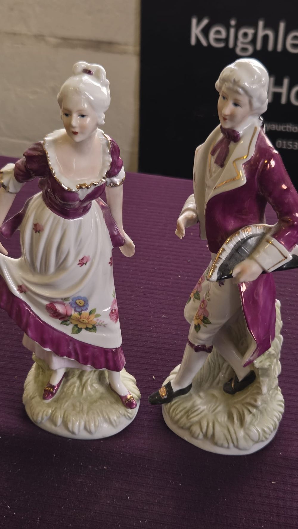 Lot 619 – A Pair of German Porcelain Figurines in the Rococo Style