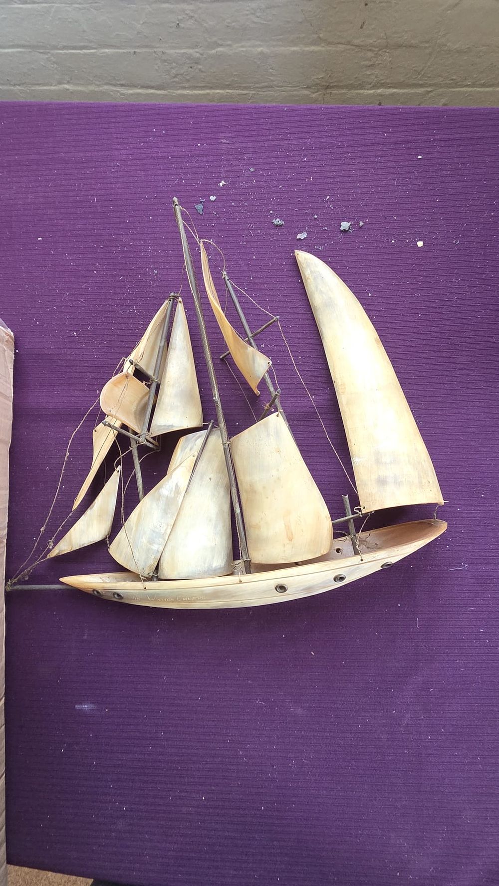 Lot 620 – A mid-to-late 20th-century carved horn model of the schooner Sir Winston Churchill