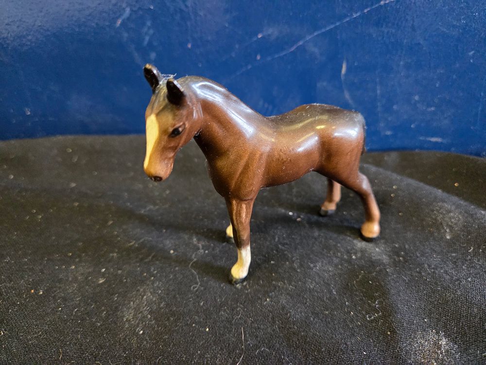 Lot 180 – A Beswick high-gloss glazed ceramic horse foal figurine