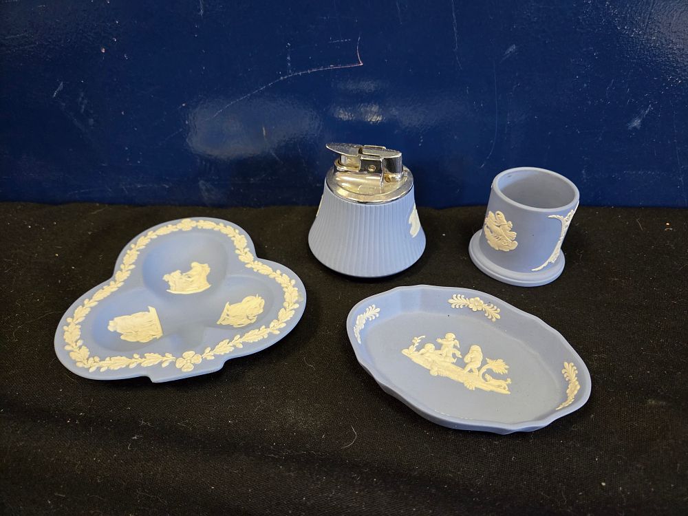 Lot 182 – A set of four Wedgwood pale blue jasperware smoker’s or dressing table items