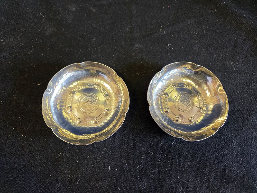 Lot 195 – A Pair of Borrowdale Hand Beaten Arts and Crafts Circular Dishes