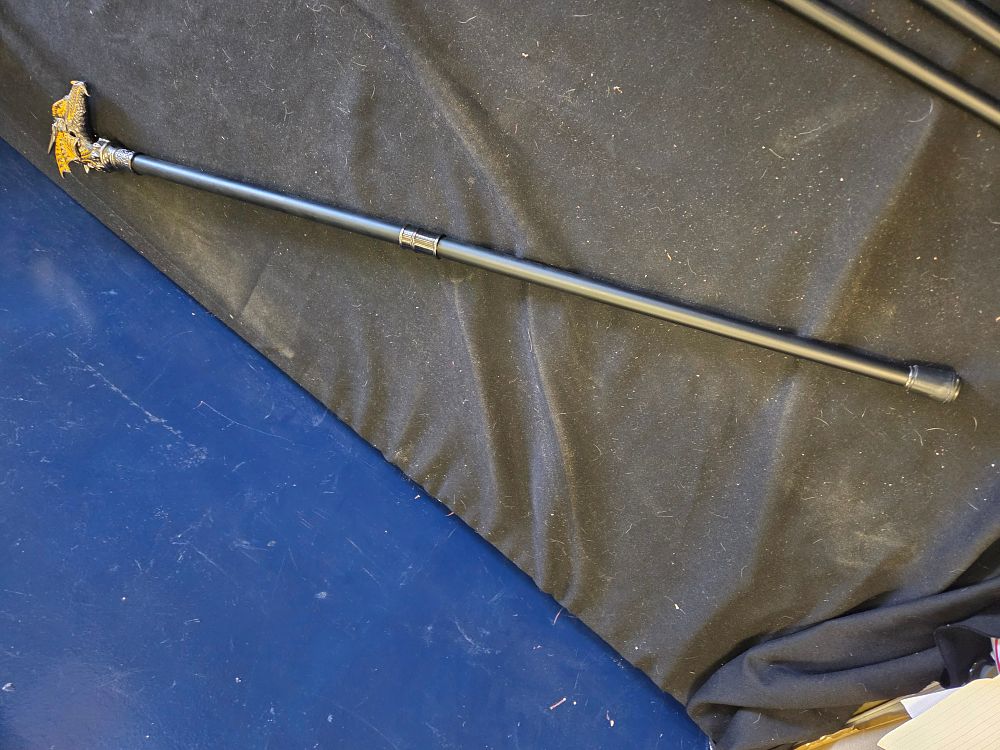 Lot 237 – A modern decorative walking cane with dragon head handle