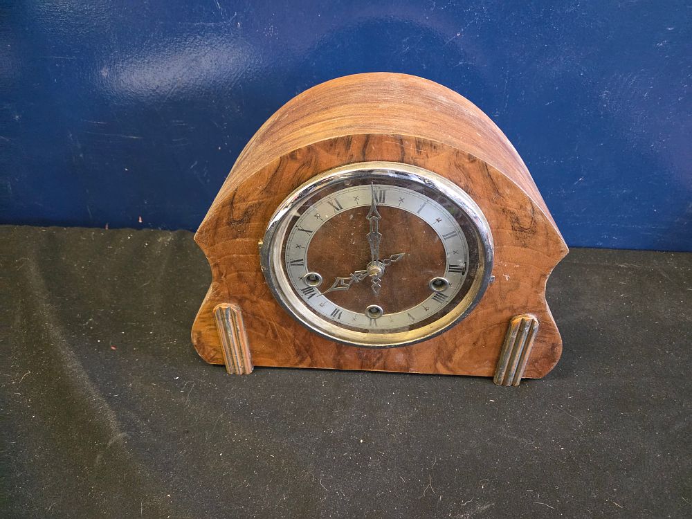 Lot 239 – Art Deco Enfield Walnut Veneered Westminster Chime Mantel Clock in working order with key