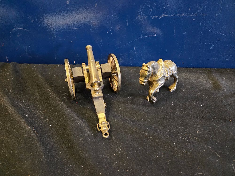 Lot 242 – Two Decorative vintage brass Models Comprising a Field Cannon and a Harnessed Horse