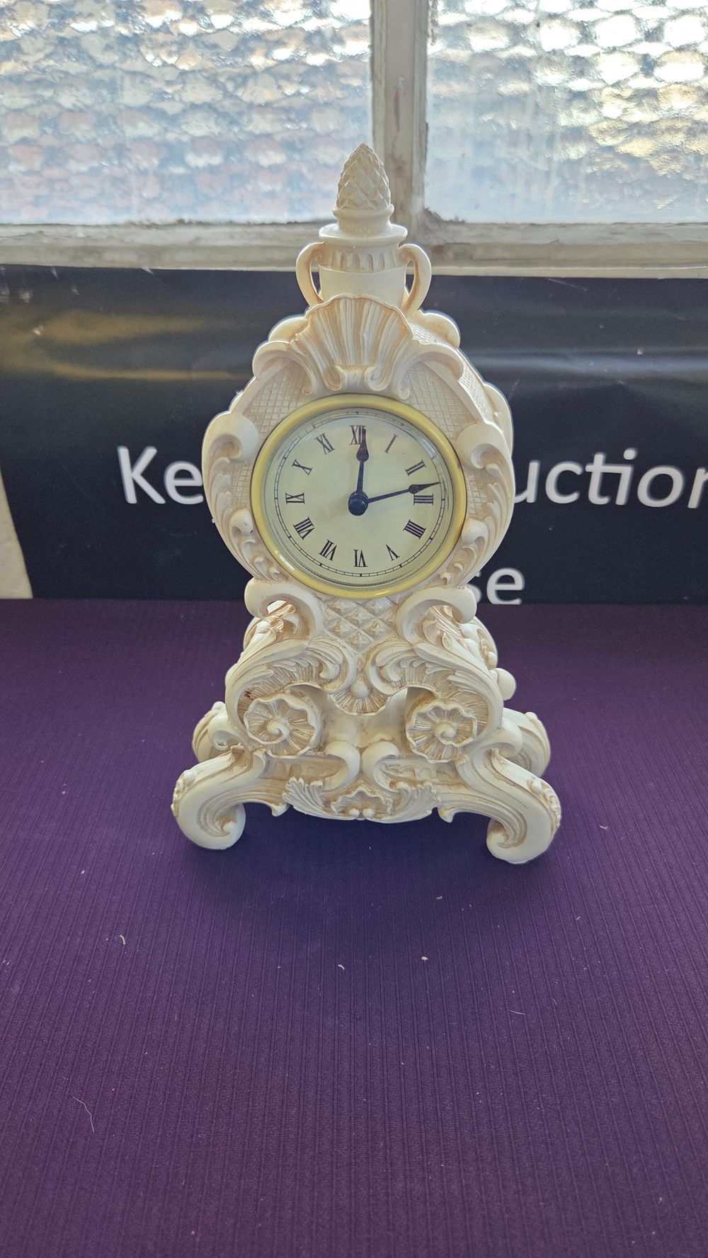 Lot 156 – A Modern Rococo Revival Style Resin Mantel Clock