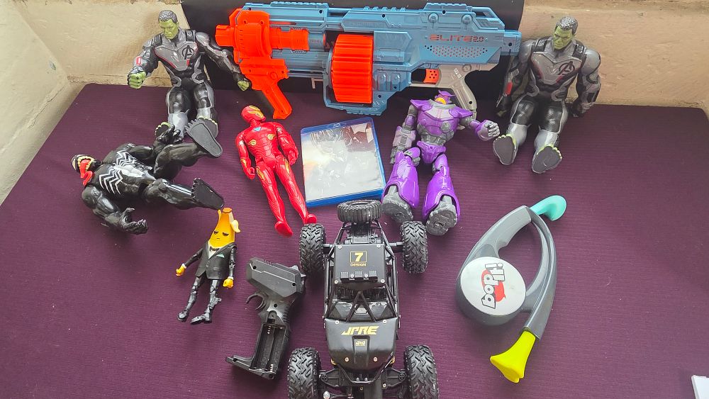 Lot 173 – A Collection of Modern Action Figures, Nerf Blaster, and Electronic Toys