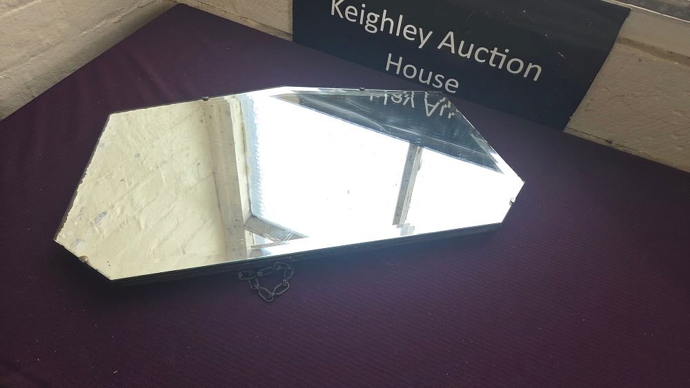 Lot 212 – An Art Deco frameless bevelled glass wall mirror, circa 1930s