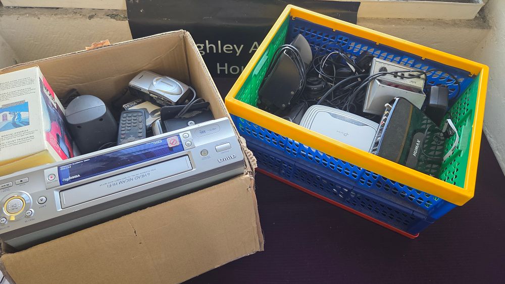 Lot 240 – Two Boxes of Household Electronics Including an Aiwa FX7700 VCR and Humax Receiver