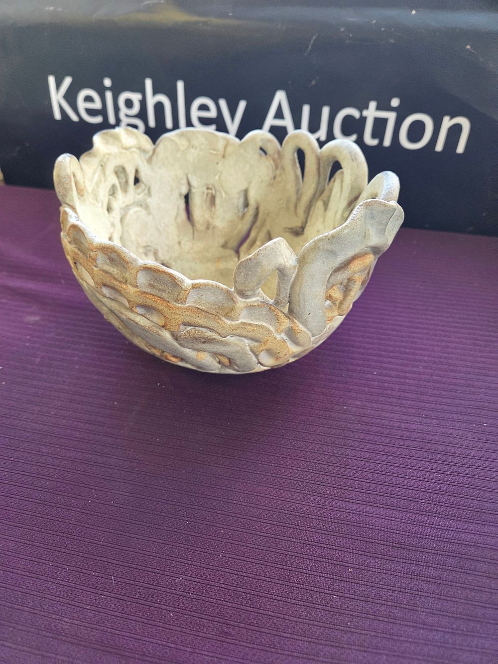Lot 645 – A contemporary studio pottery reticulated stoneware bowl
