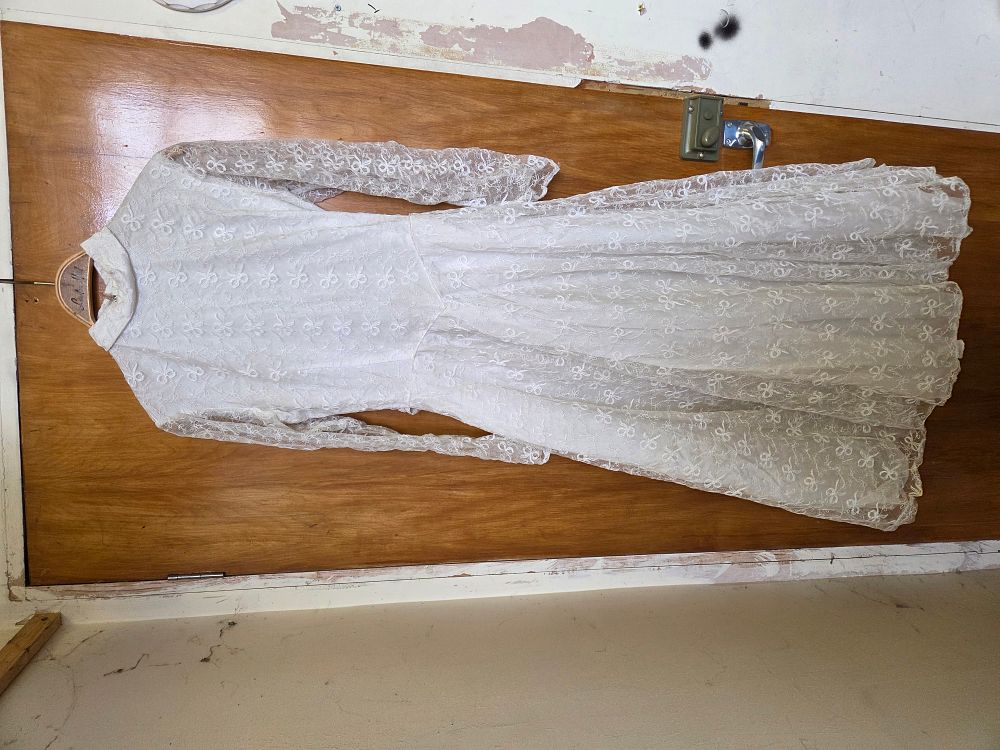 Lot 248 – A vintage late 1960s to 1970s white lace wedding gown