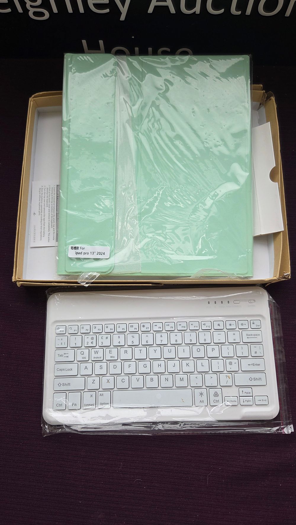Lot 180 – A Wireless Keyboard and Folio Case for iPad Pro 13-inch