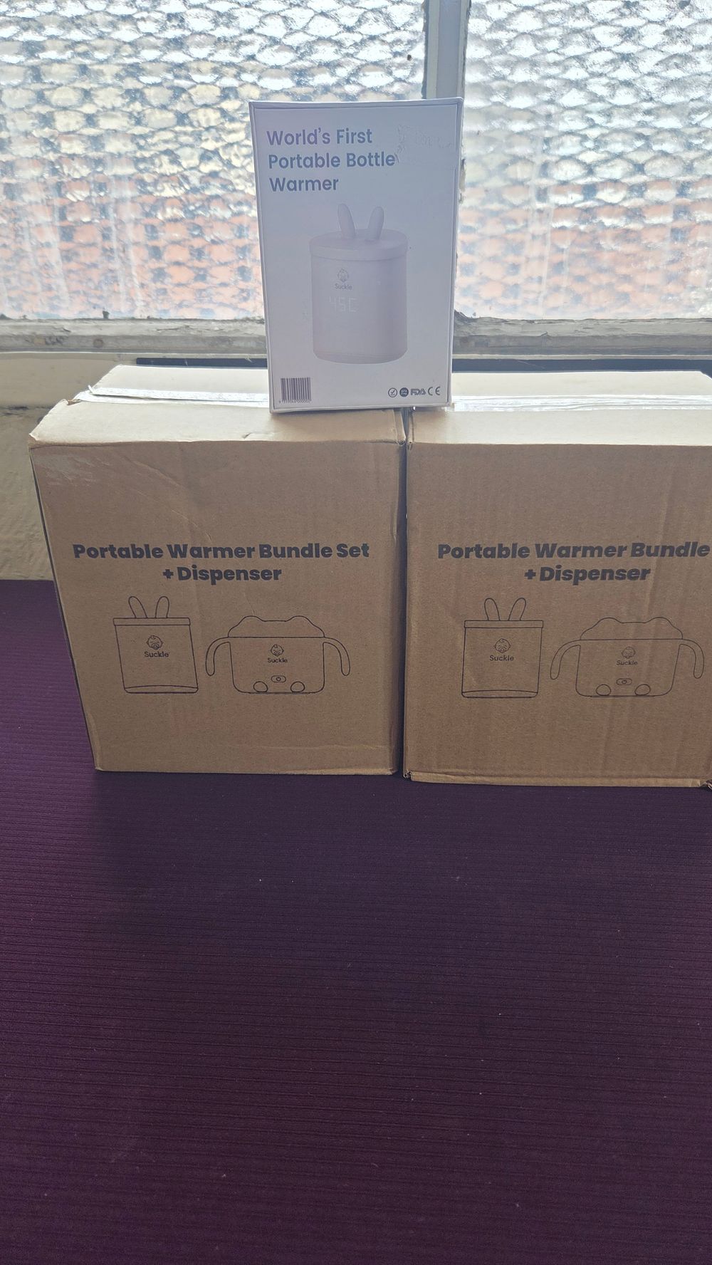 Lot 261 – A Selection of New Suckle Portable Bottle Warmers and Bundle Sets