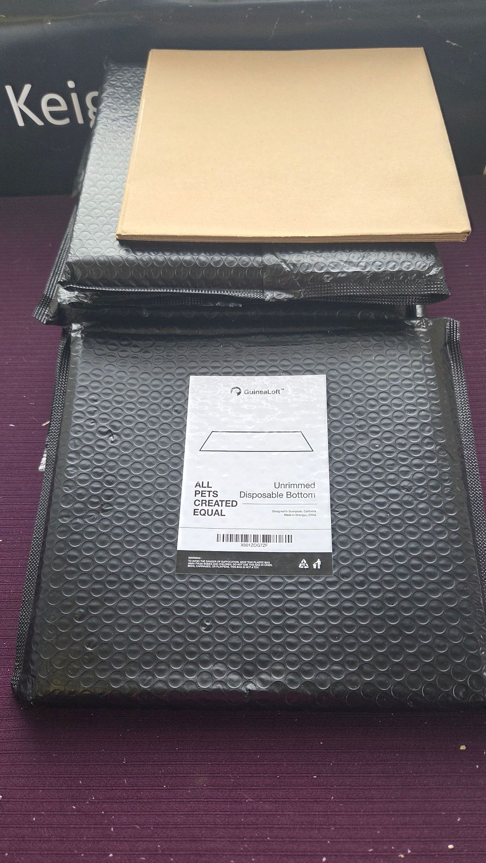 Lot 284 – Six Packets of GuineaLoft Unrimmed Disposable Bottom Liners for Pet Enclosures