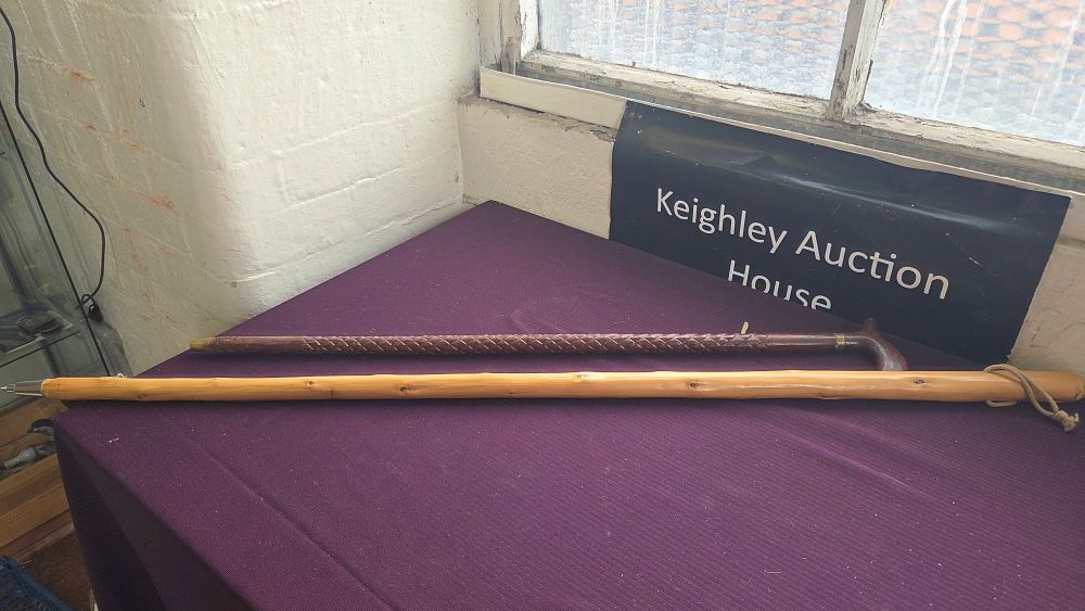 Lot 327 – Two Wooden Walking Aids Including a Carved Derby Handle Stick and a Hiking Staff