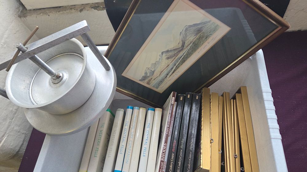 Lot 338 – An Assortment of Household Items including an Aluminium Press, a Framed Landscape Print, Books, and Picture Frames