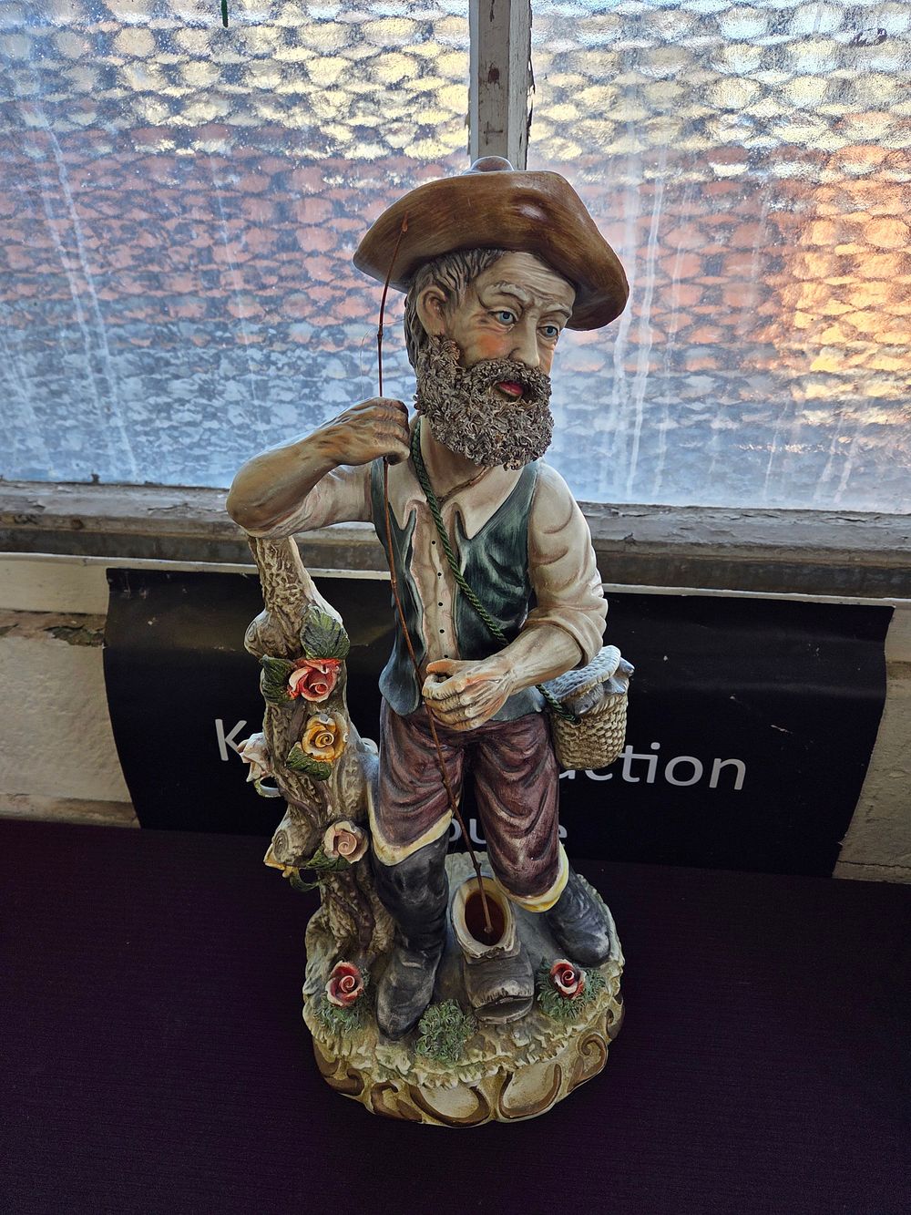 Lot 219 – A Large Capodimonte Style Painted Ceramic Figurine of a Fisherman