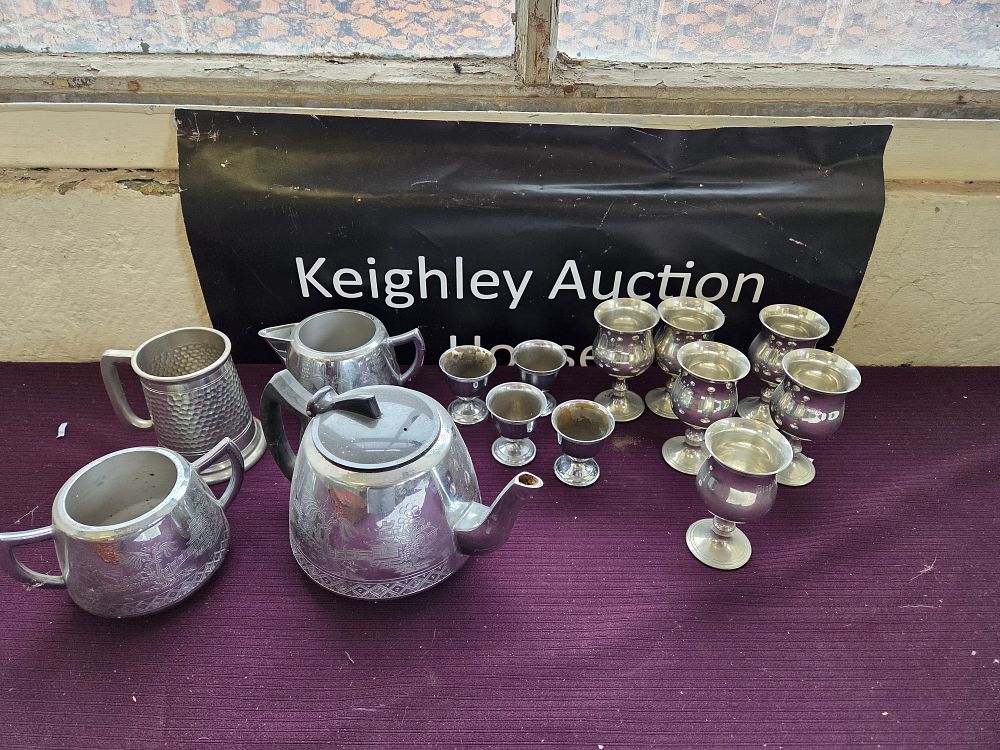 Lot 358 – An assortment of approximately 15 pieces of silver-plated and white metal tableware including a Chinoiserie style tea service and drinking vessels