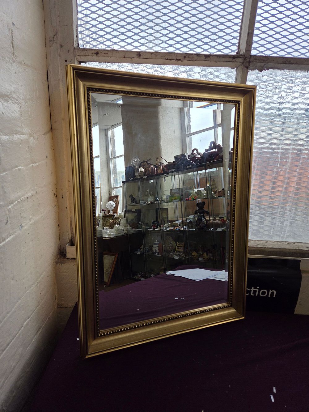 Lot 375 – A late 20th-century gilt-framed rectangular wall mirror in the neo-classical style
