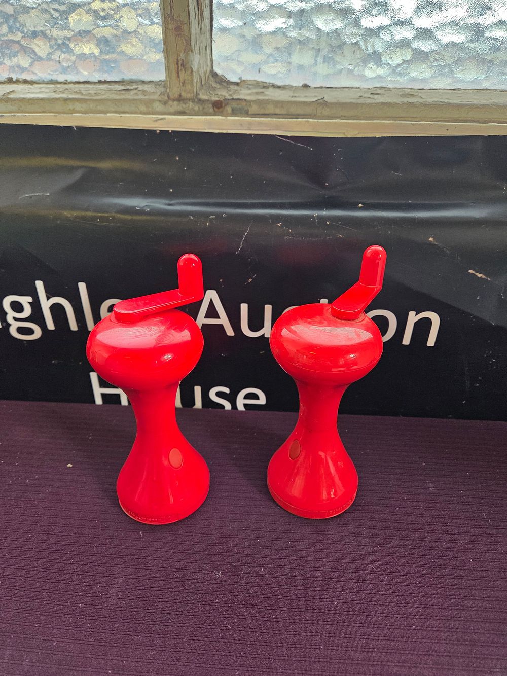 Lot 601 – A Pair of Vintage IKEA Red Plastic Wind-up LED Flashlights