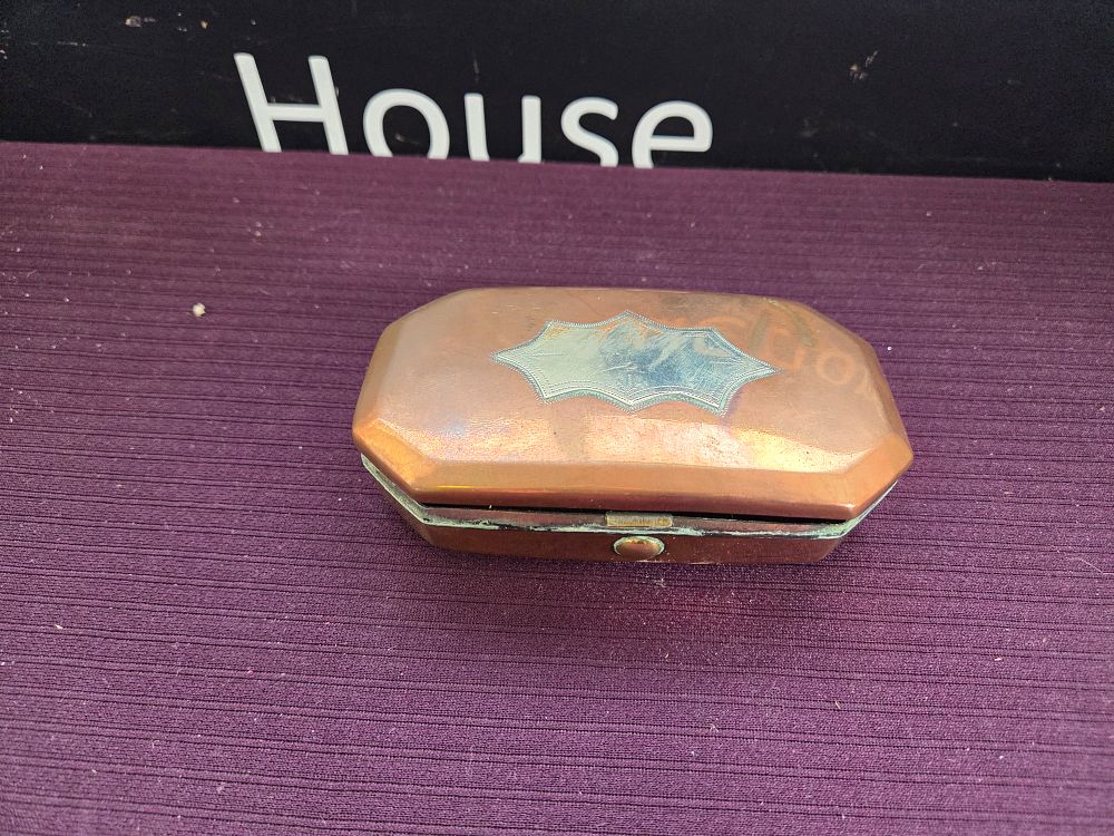 Lot 604 – Late 19th or early 20th century octagonal copper and white metal snuff box