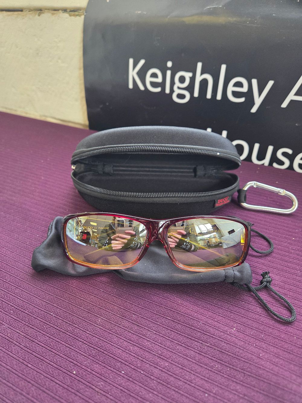 Lot 622 – A pair of Duco fit-over polarised sunglasses with case and pouch