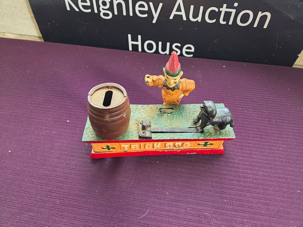 Lot 625 – Trick Dog Mechanical Coin Bank Reproduction